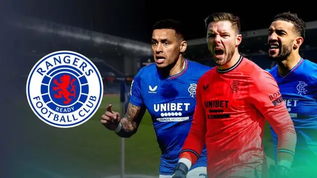 Jack Butland (Rangers), James Tavernier (Rangers) and Connor Goldson (Rangers) next to the Rangers badge