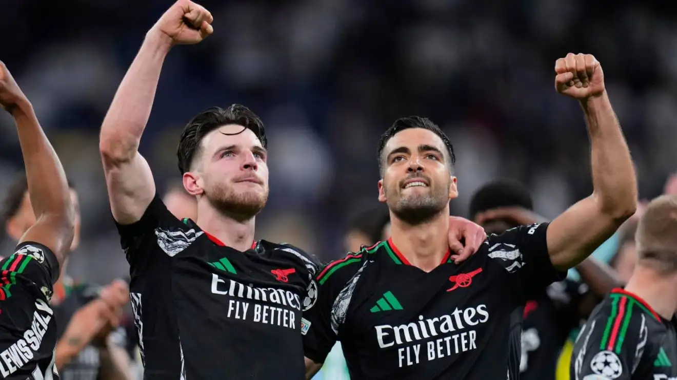 Arsenal duo Declan Rice and Mikel Merino celebrate victory over Real Madrid