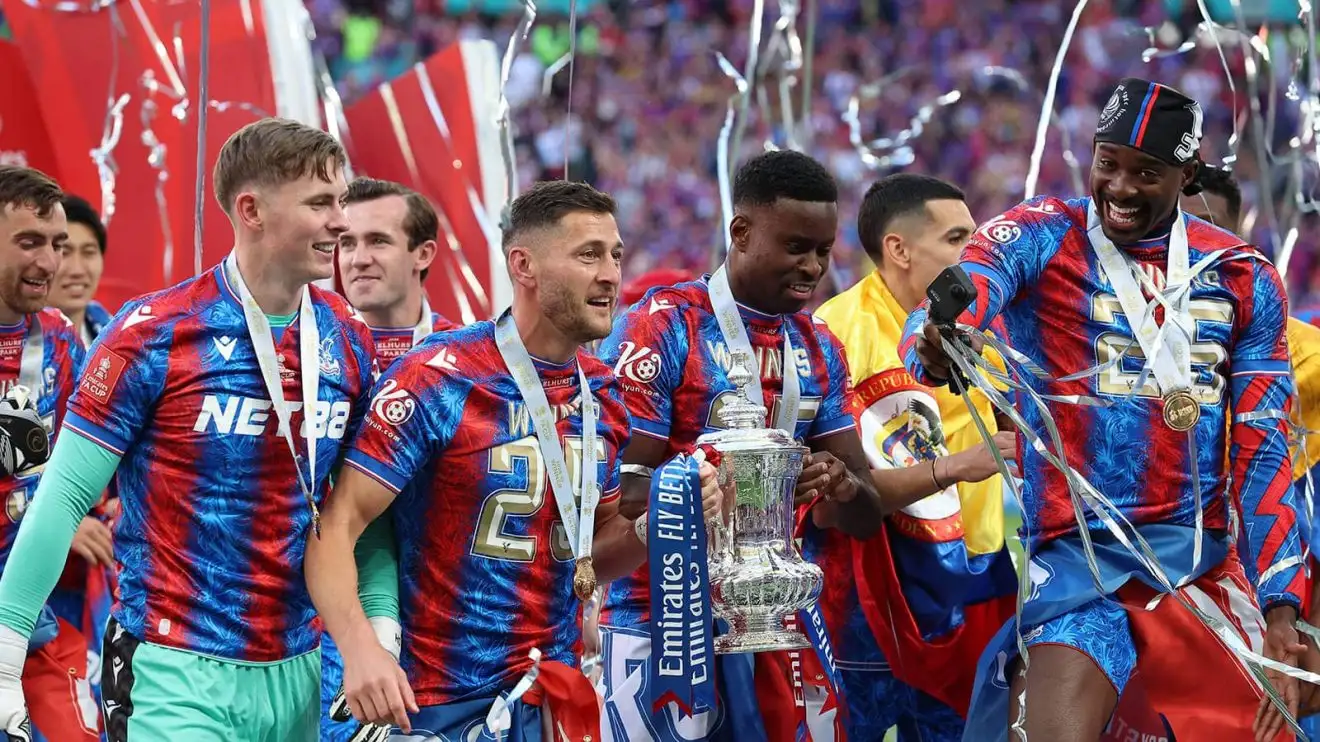 Arsenal target Marc Guehi surrounded by his Crystal Palace team-mates