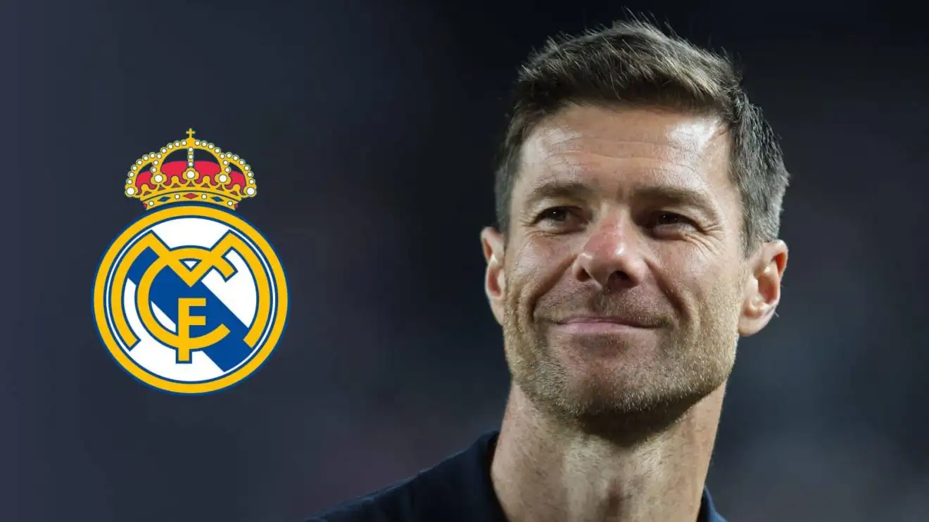 Real Madrid manager Xabi Alonso Xabi Alonso next to the Real Madrid badge - copyright TEAMtalk