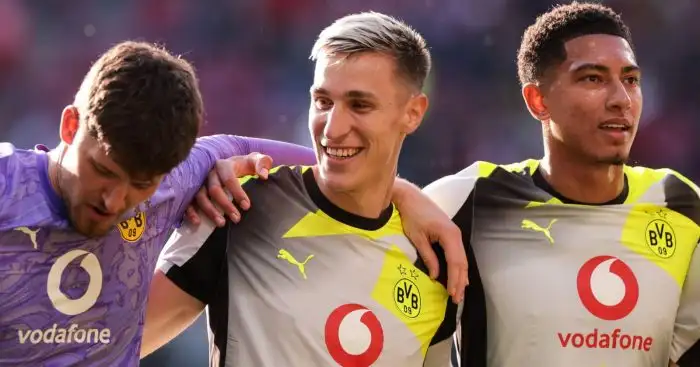 Borussia Dortmund trio Gregor Kobel Nico Schlotterbeck and Jobe Bellingham - copyright TEAMtalk