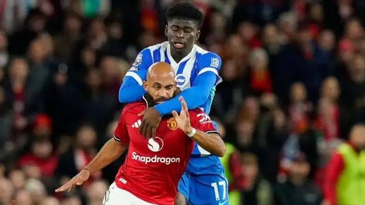 Carlos Baleba challenging Bryan Mbeumo