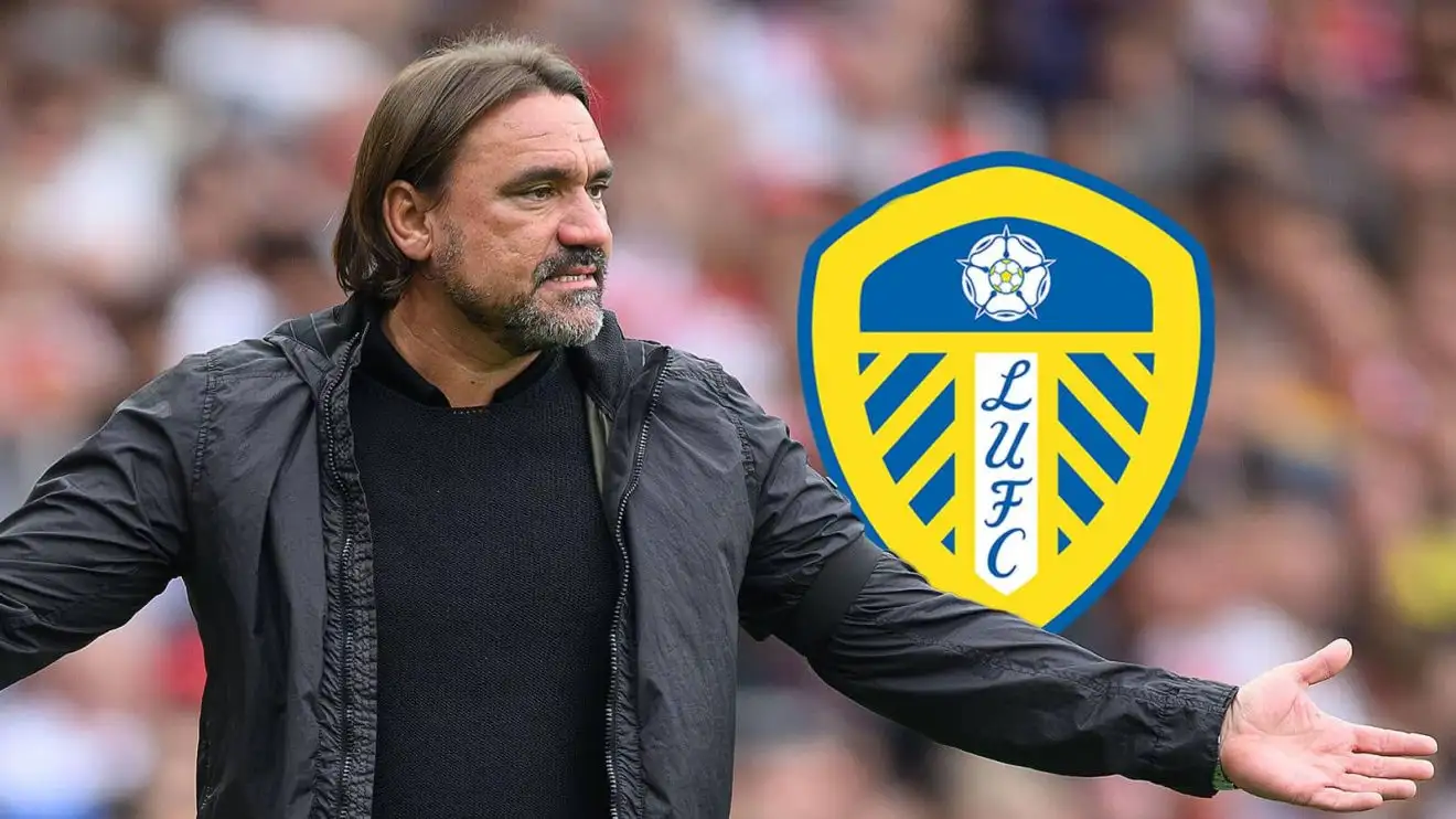 Leeds supporters still remain behind Daniel Farke despite their poor away record Leeds manager Daniel Farke next to the club crest