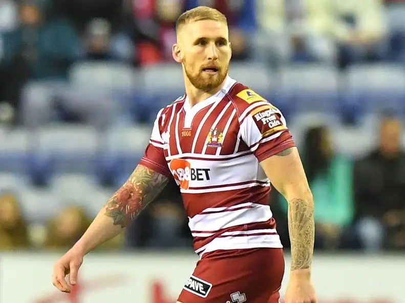 Wane relieved as Tomkins seals win