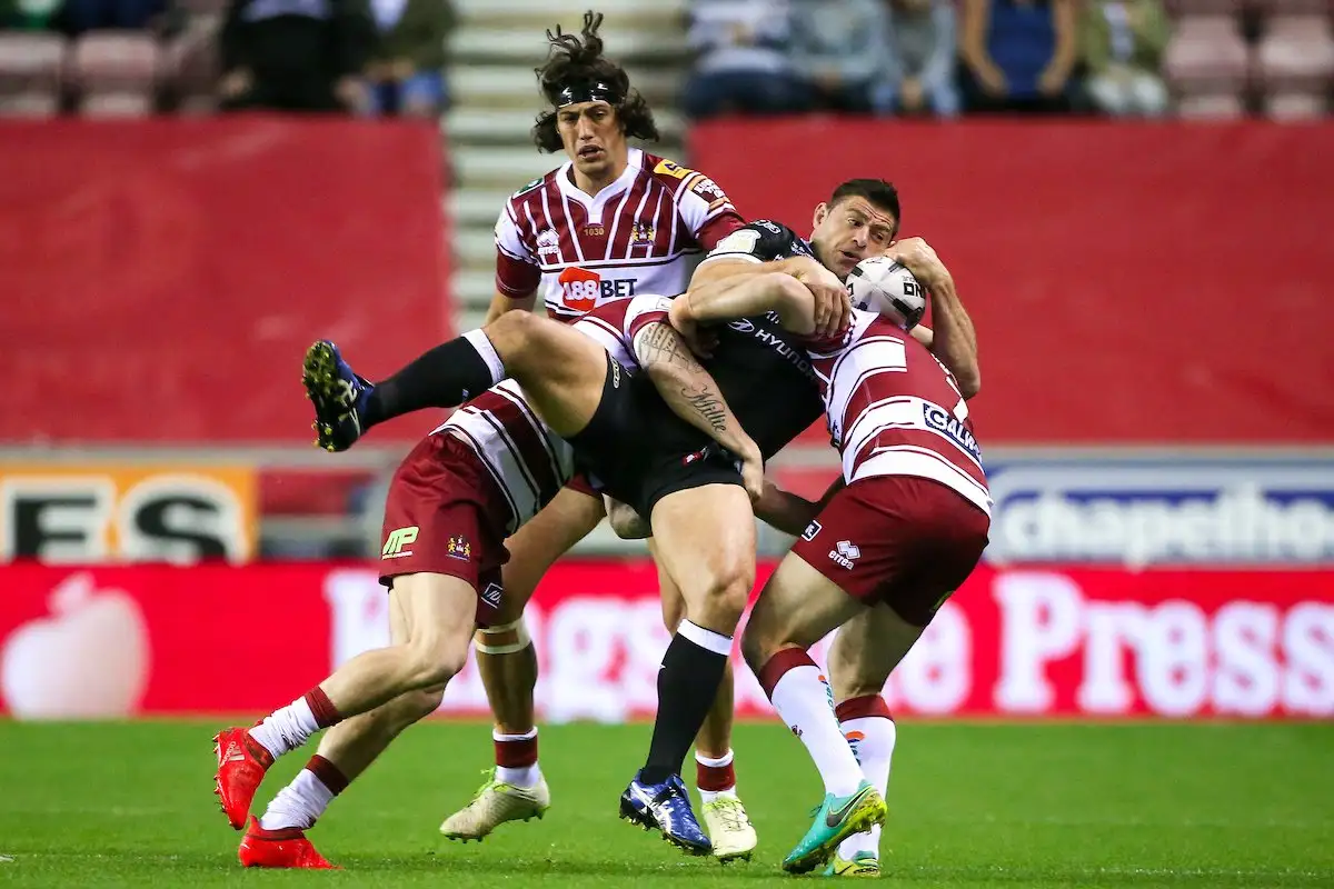 Wigan hold off Hull to reach grand final