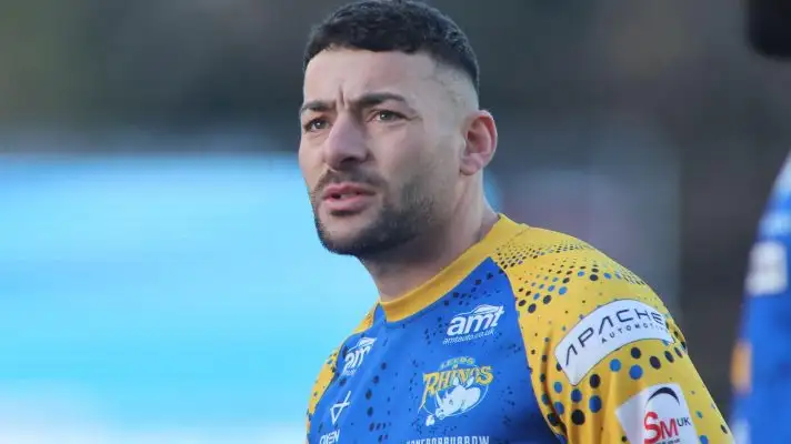 Jake Connor warms up ahead of a Leeds Rhinos game in 2025
