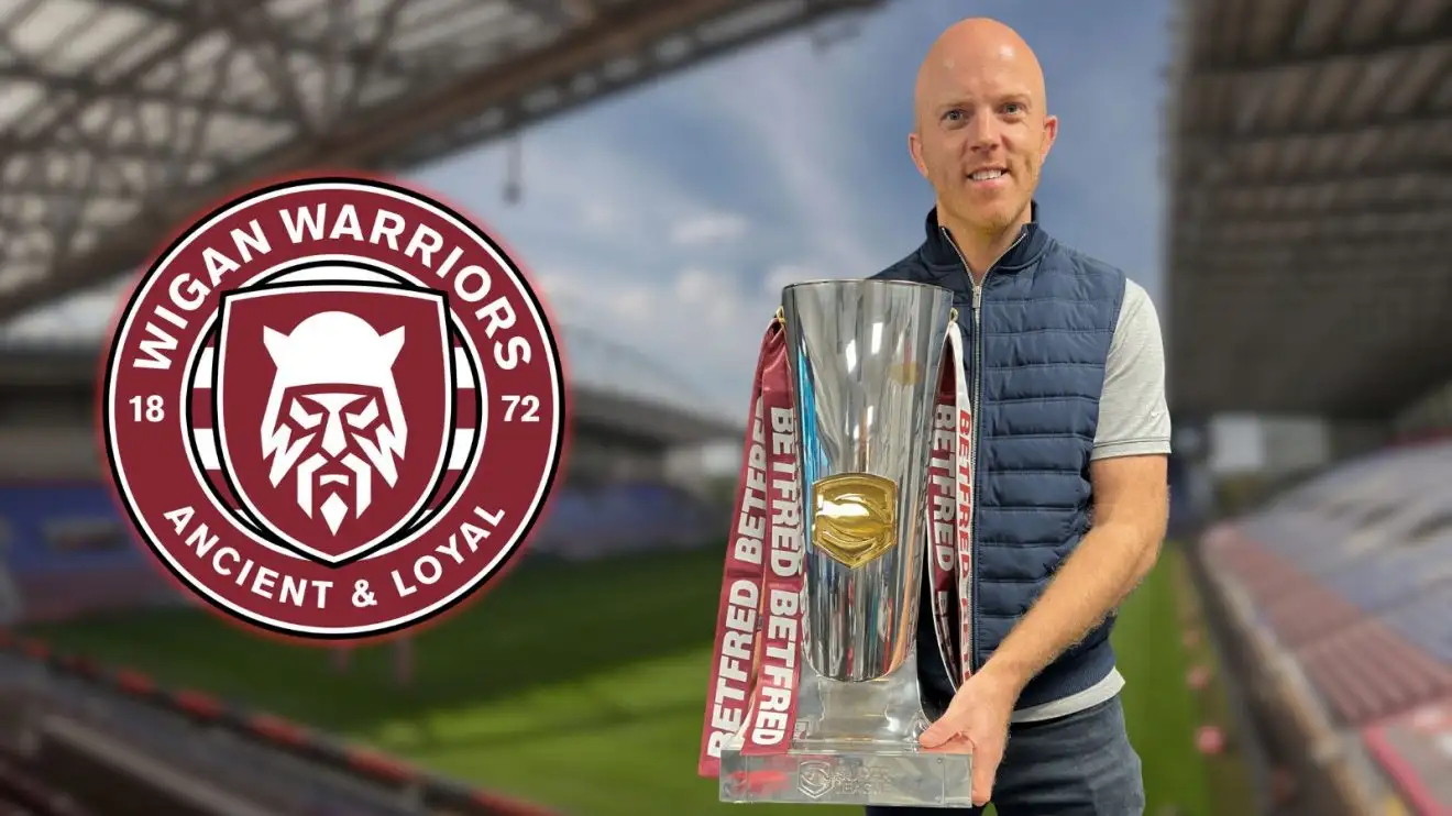 Wigan Warriors badge, Tom Young with the Super League trophy, The Brick Community Stadium as background