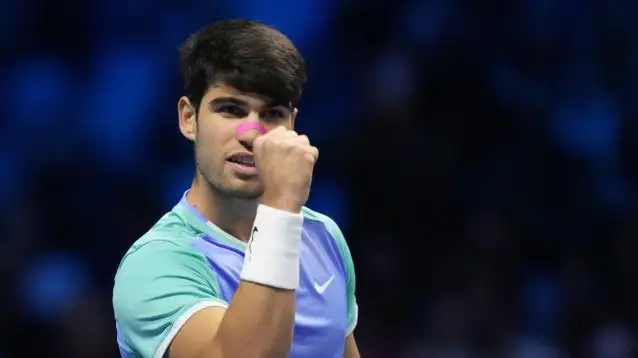 Carlos Alcaraz celebrates his victory at the ATP Finals