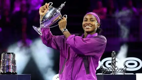 Pictured: Coco Gauff lifts the WTA Finals title in Riyadh.