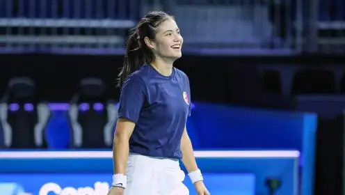 Emma Raducanu smiles during a practice session