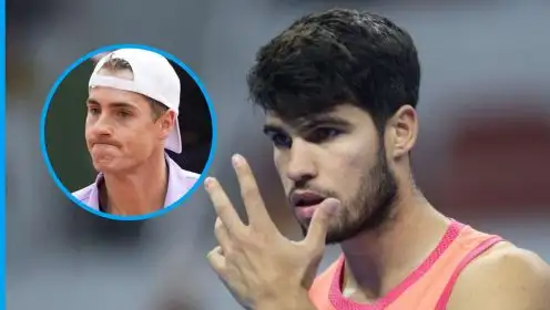 Pictured: Carlos Alcaraz and John Isner