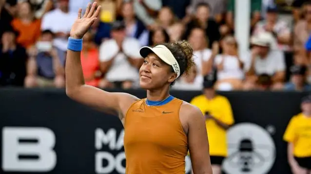 Pictured: Naomi Osaka celebrates after a win.