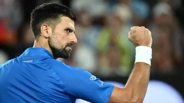 Pictured: Novak Djokovic celebrates during his match.