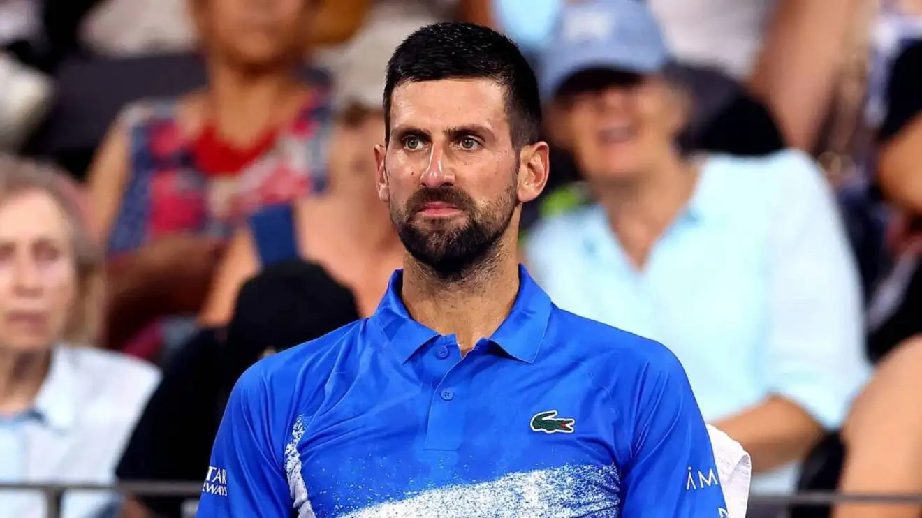 Novak Djokovic looks on during his loss in Brisbane