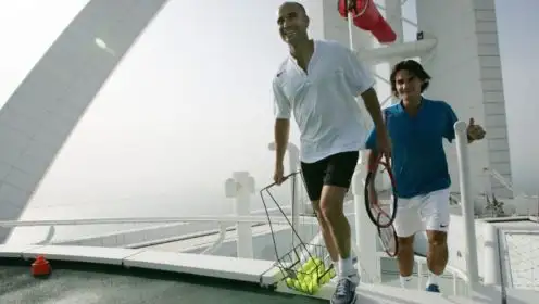 Andre Agassi & Roger Federer head onto the Burj Al Arab in 2005.