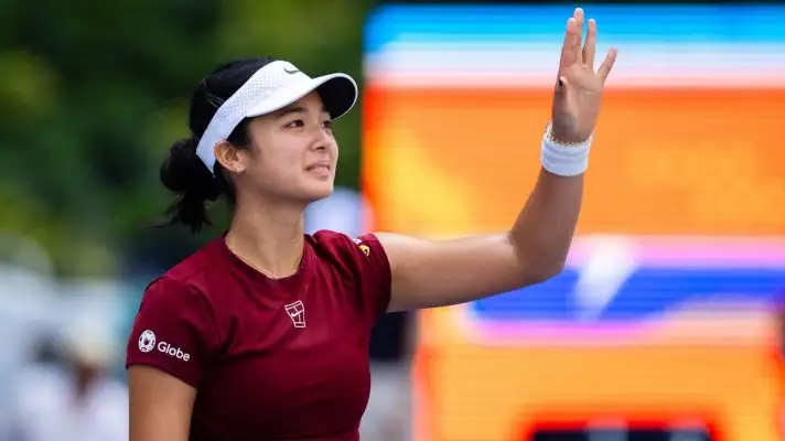 Alex Eala celebrates after beating Iga Swiatek at the Miami Open.