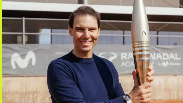 Rafael Nadal with an Olympic torch