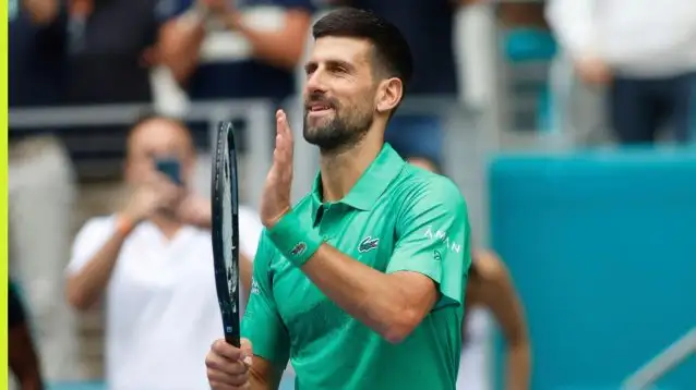 Novak Djokovic holding his racquet