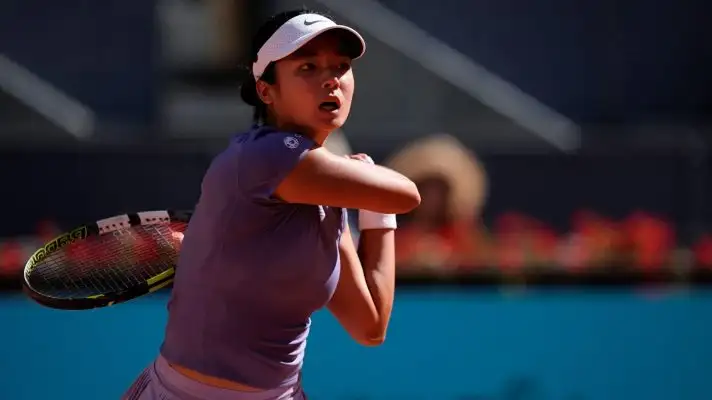 Pictured: Alex Eala hits a backhand at the 2025 Madrid Open.