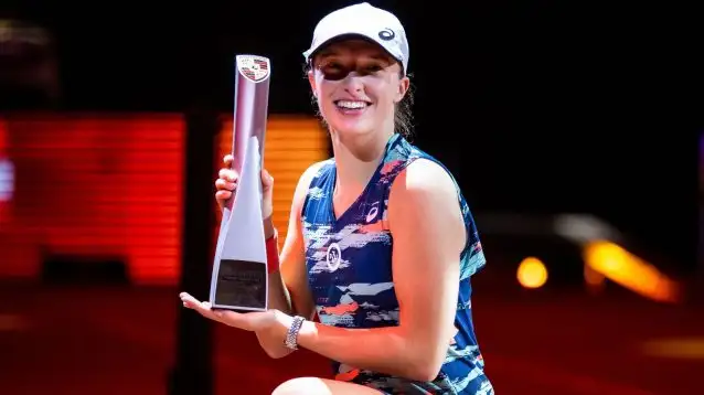Iga Swiatek celebrates winning the WTA Stuttgart Open