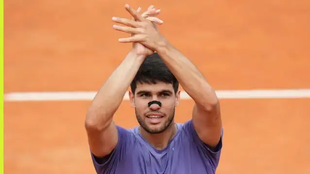 Carlos Alcaraz celebrates