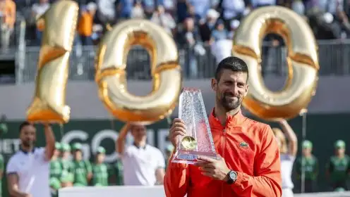 Pictured: Novak Djokovic lifts his 100th ATP Tour title in Geneva.