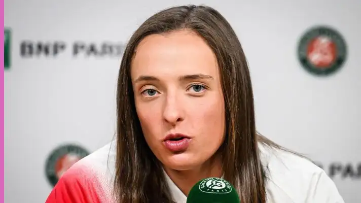 Iga Swiatek talks to the media