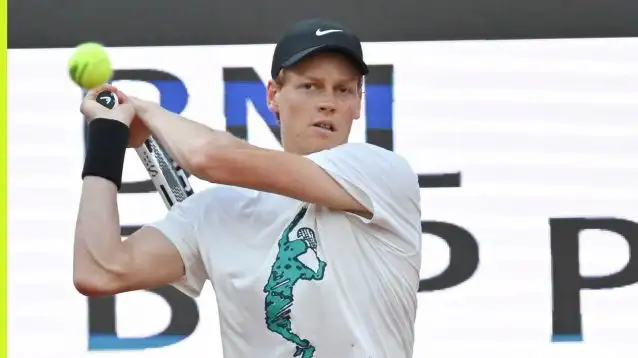 Pictured: Jannik Sinner plays a backhand
