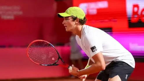 Joao Fonseca returning a serve