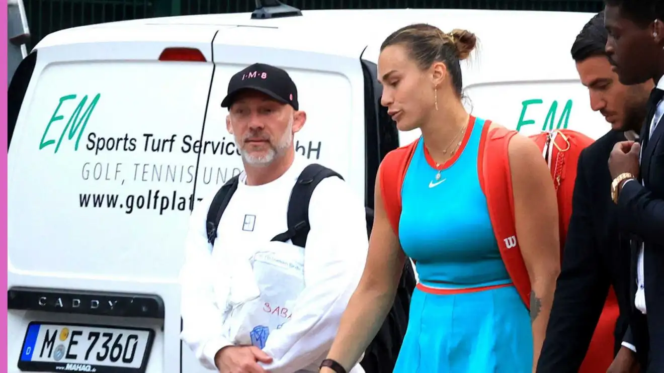 Pictured: Aryna Sabalenka with her coach