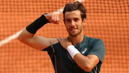 Pictured: Lorenzo Musetti celebrates.