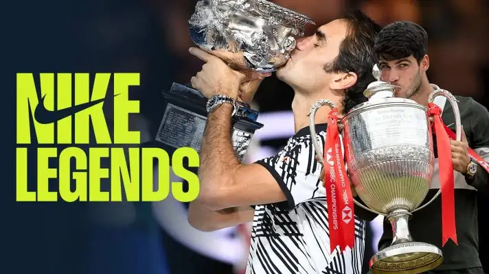 Roger Federer and Carlos Alcaraz pose with Wimbledon trophy