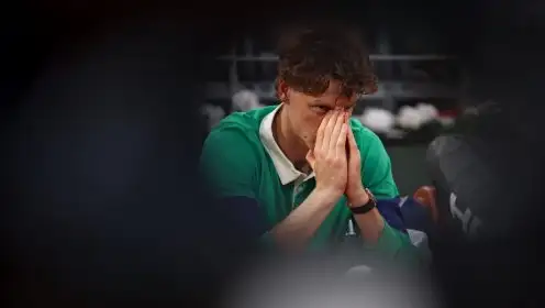 Jannik Sinner looks on after losing the French Open final.