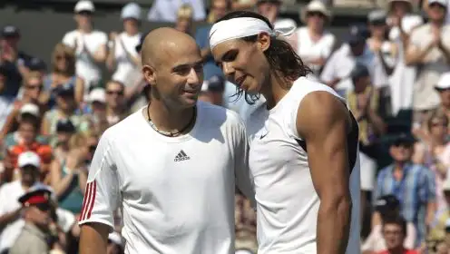 Rafael Nadal at the net with Andre Agassi