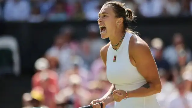 Aryna Sabalenka fistpumps during a match.