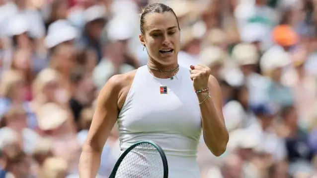 Aryna Sabalenka fistpumps during a match.