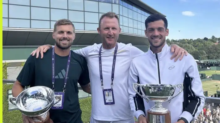 Coach Barry Fulcher with Wimbledon men's doubles champions Lloyd Glasspool and Julian Cash