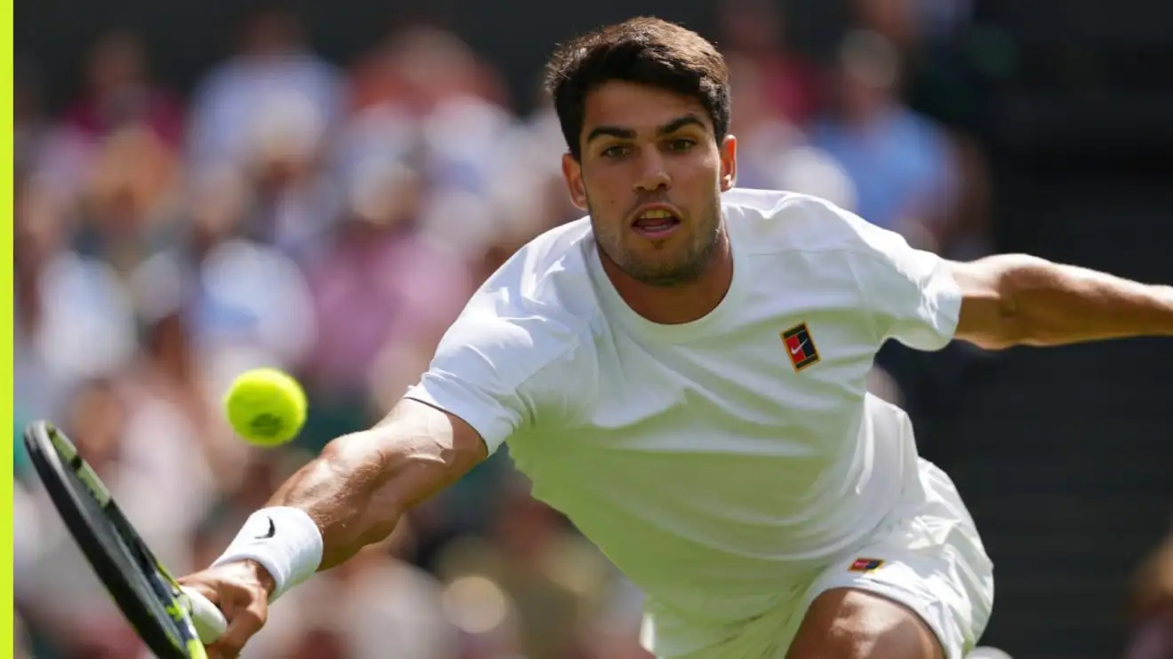 Carlos Alcaraz in action at Wimbledon