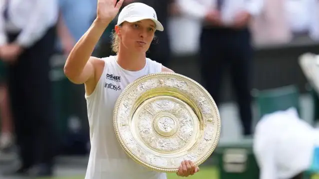 Pictured: Iga Swiatek lifts the Wimbledon title.