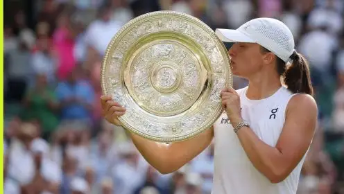 Pictured: Iga Swiatek kisses Wimbledon trophy