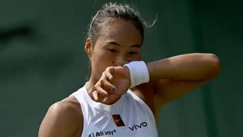 Zheng Qinwen looking down at Wimbledon