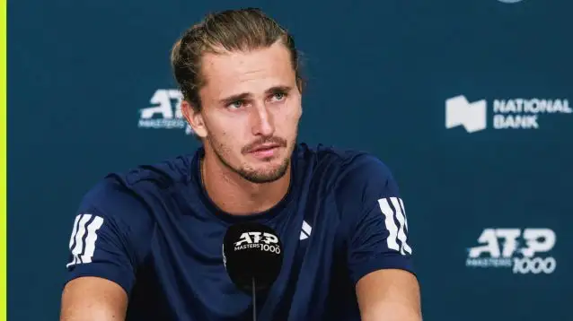 Alexander Zverev talks to reporters