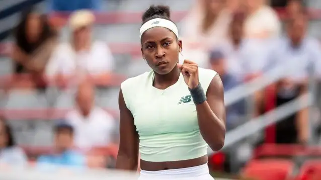 Pictured: Coco Gauff fistpumps during a match.