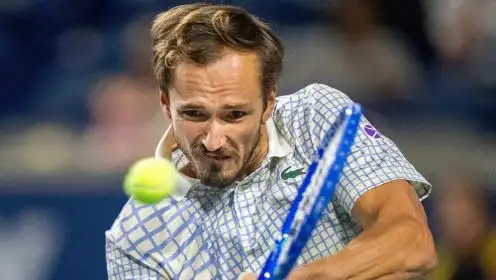 Daniil Medvedev hits a backhand.